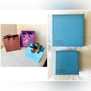TWO GIFT BOXES AND THREE GIFT BAGS FROM LUXURY BOUTIQUE STORES